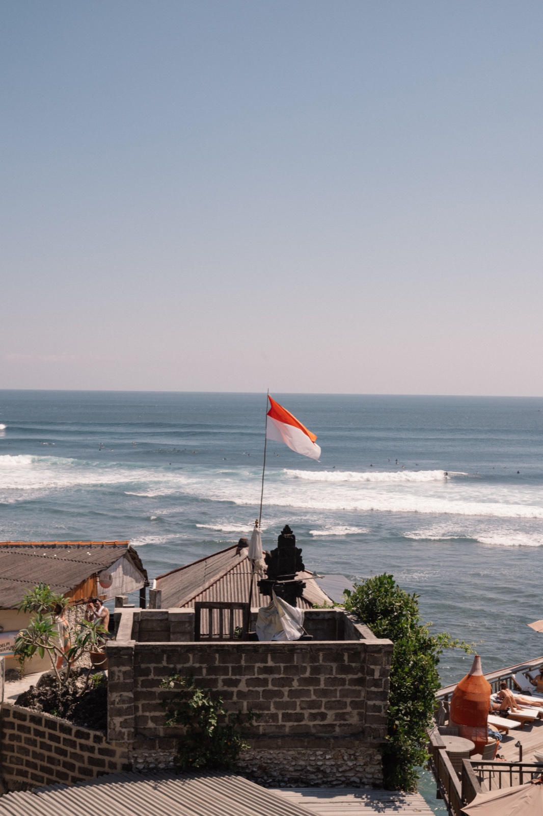 Indonesian flag over the surf break